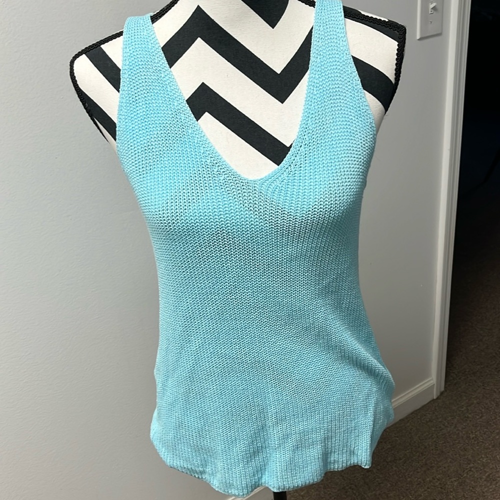 Large V-neck sleeveless sweater